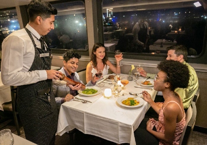 Guests eating their salad and enjoying the Boston views.