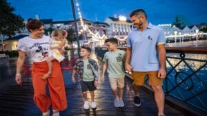 happy family walking at Disney BoardWalk